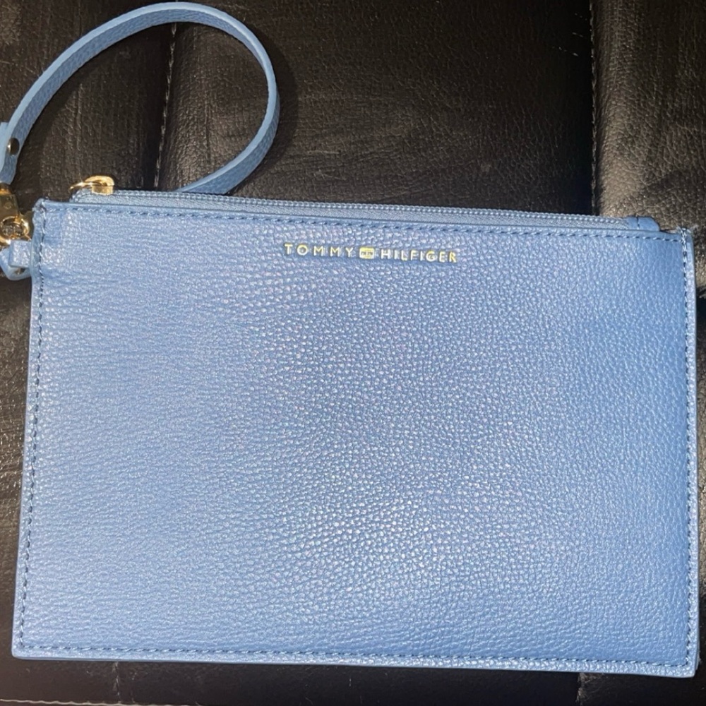 Blue Tommy Hilfiger wristlet.